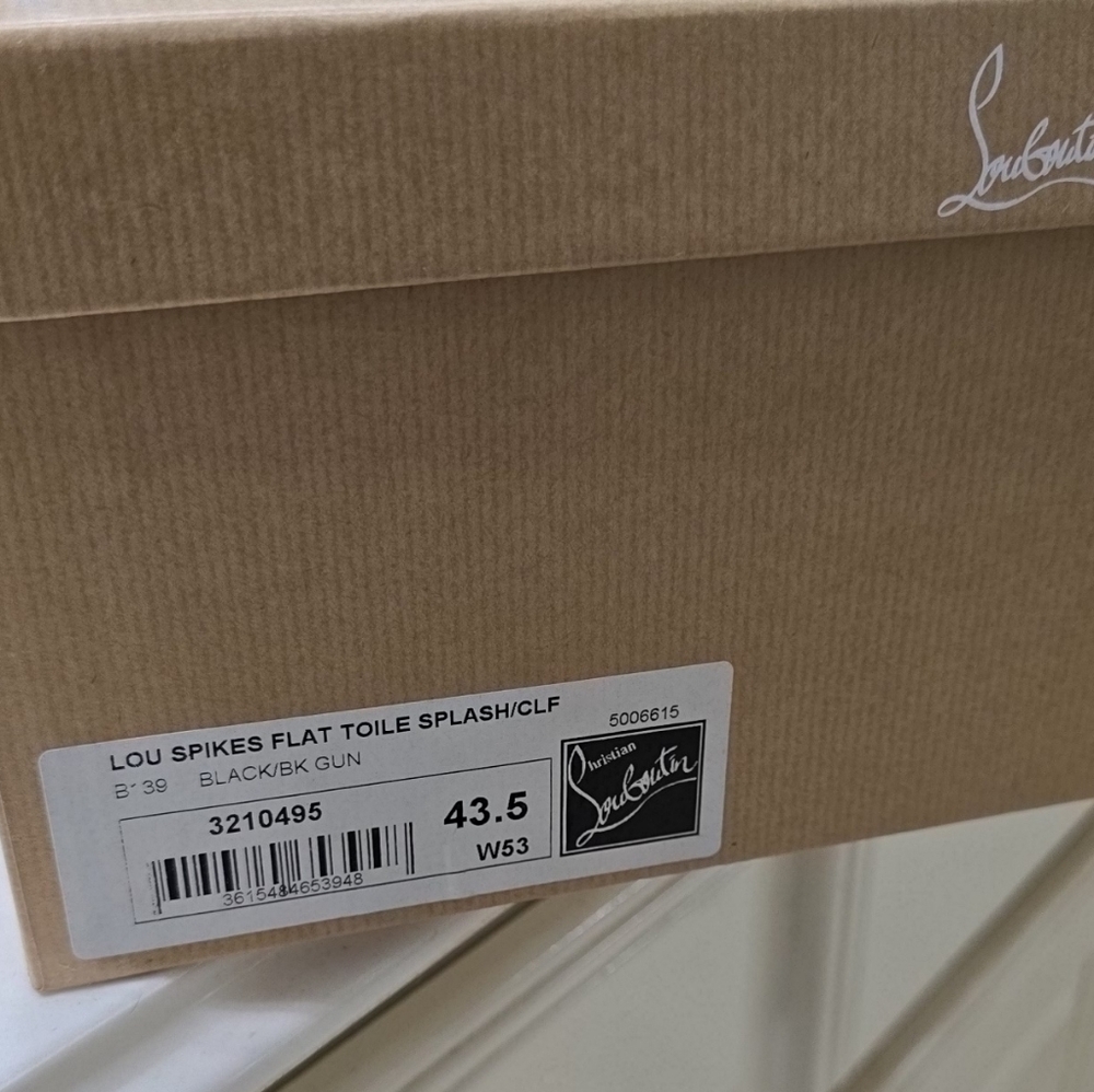 Christian Louboutin Lou Spikes Flat in Black Never Been Worn